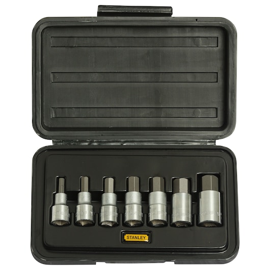 Stanley hex bit socket set in a black plastic case, showing seven sockets neatly arranged inside.