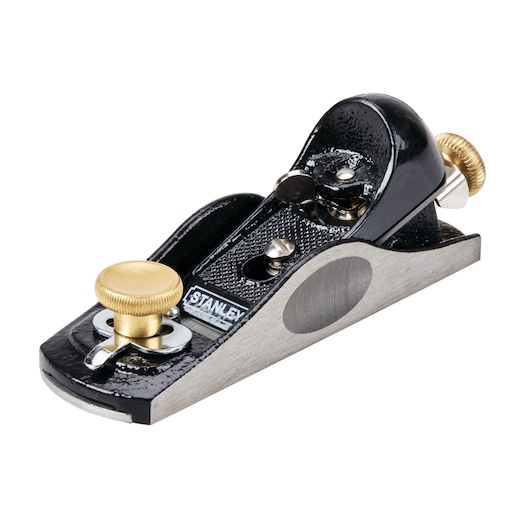 STANLEY 12-960 block plane with black body, brass adjustment knobs, product side angle on white background.