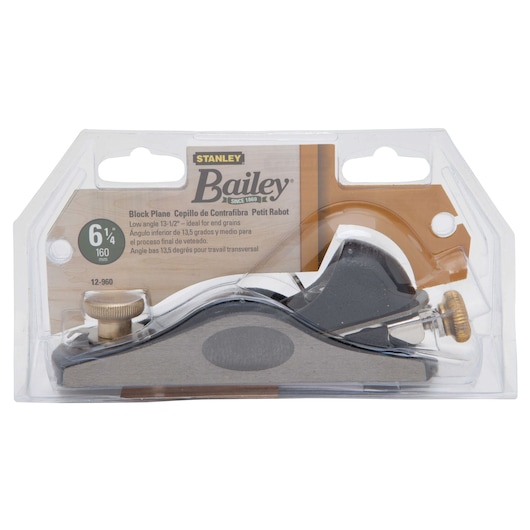 STANLEY 12-960 Bailey block plane in retail packaging, low angle metal body with brass adjustment knob, front view.