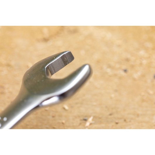 STANLEY FMMT13081-0 open-end wrench close-up photography on light brown surface.